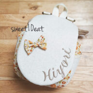 お名前刺繍入りリボンブローチベビーリュック （花柄　ナチュラオレンジ）